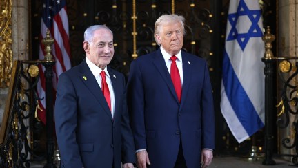 PALM BEACH, FLORIDA - DECEMBER 29: U.S. President Donald Trump welcomes Israeli Prime Minister Benjamin Netanyahu to his Mar-a-Lago club on December 29, 2025 in Palm Beach, Florida. The two leaders are scheduled to hold a bilateral meeting to discuss regional security in the Middle East as well as the U.S.-Israel partnership. (Photo by Joe Raedle/Getty Images)