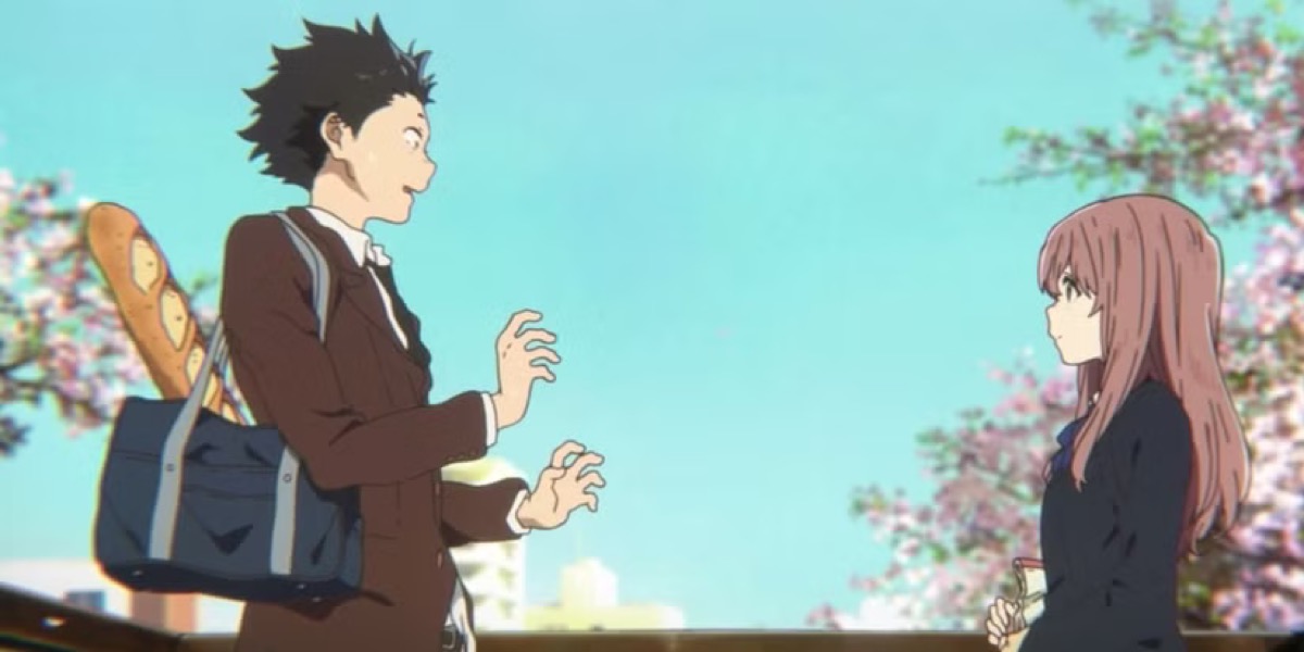 A boy excitedly gestures to a girl in "A Silent Voice"