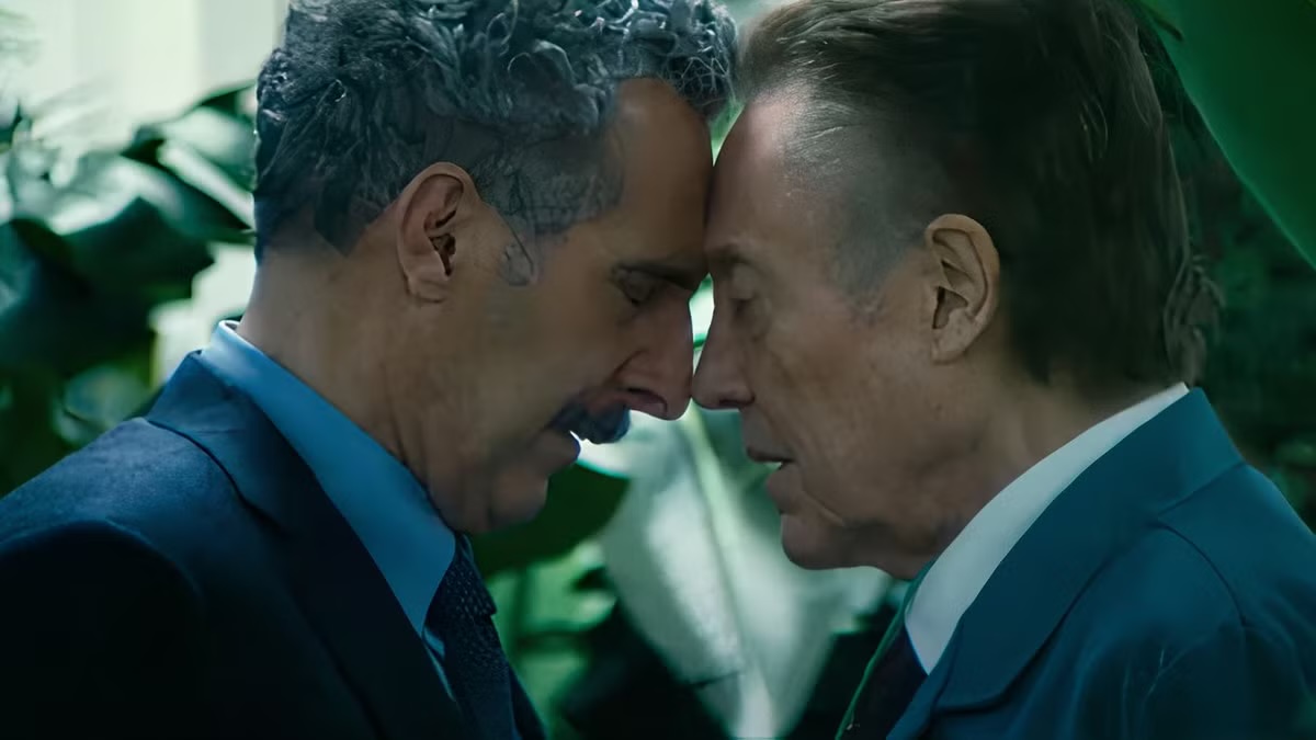 Two men tenderly touch foreheads in "Severence"