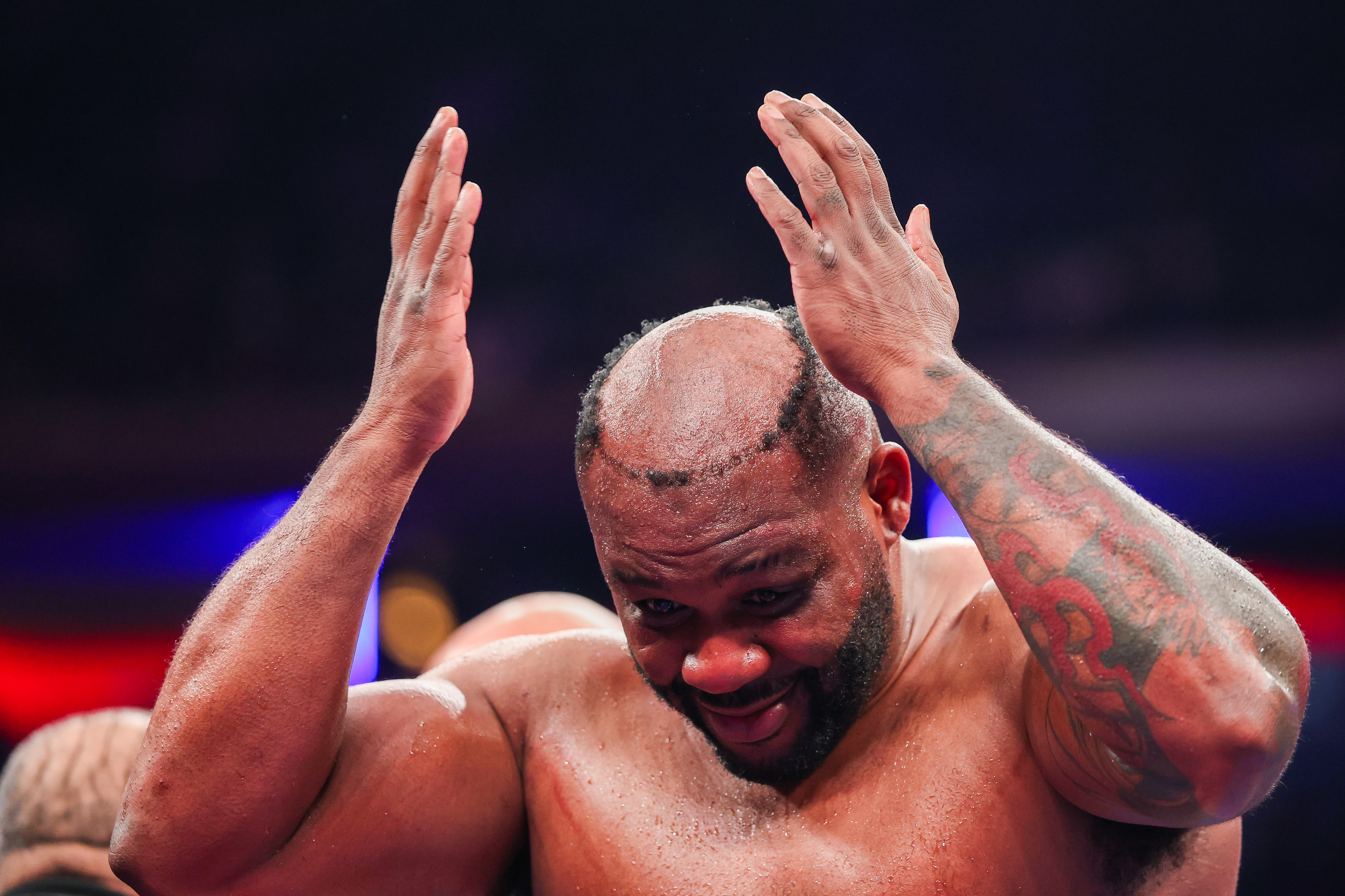 NEW YORK, NEW YORK - JANUARY 31: Jarrell Miller reacts to his wig falling off in a heavyweight bout against Kingsley Ibeh during the Ring 6 fight at Madison Square Garden on January 31, 2026 in New York City. (Photo by Ishika Samant/Getty Images)