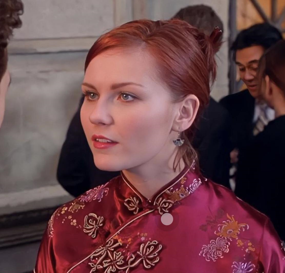 Kirsten Dunst as Mary Jane in Spider-man wearing a cheongsam