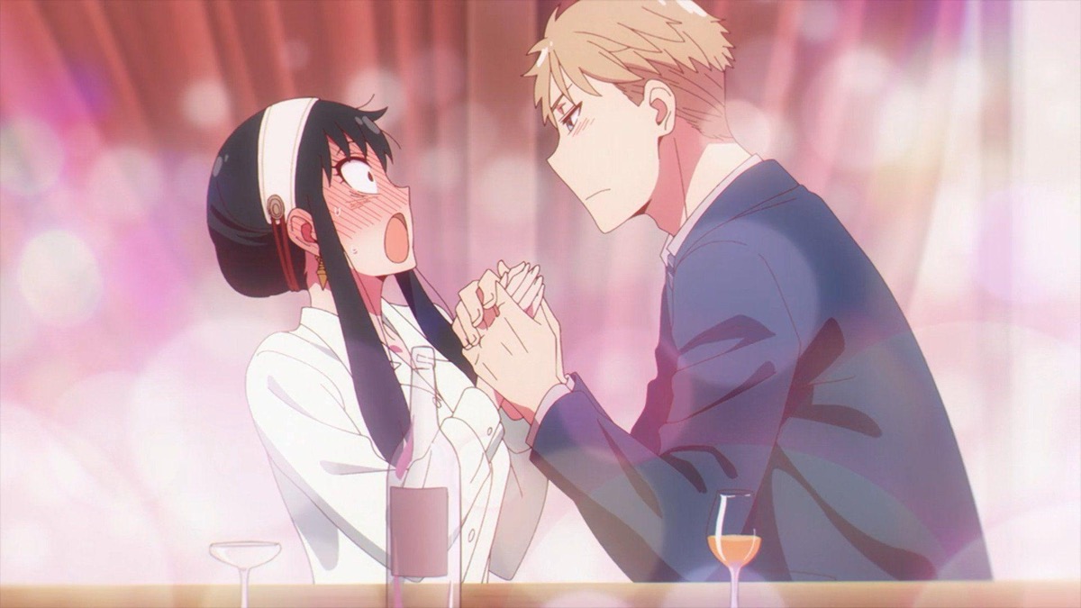 A man holds the hands of a furiously blushing woman in "Spy x Family"