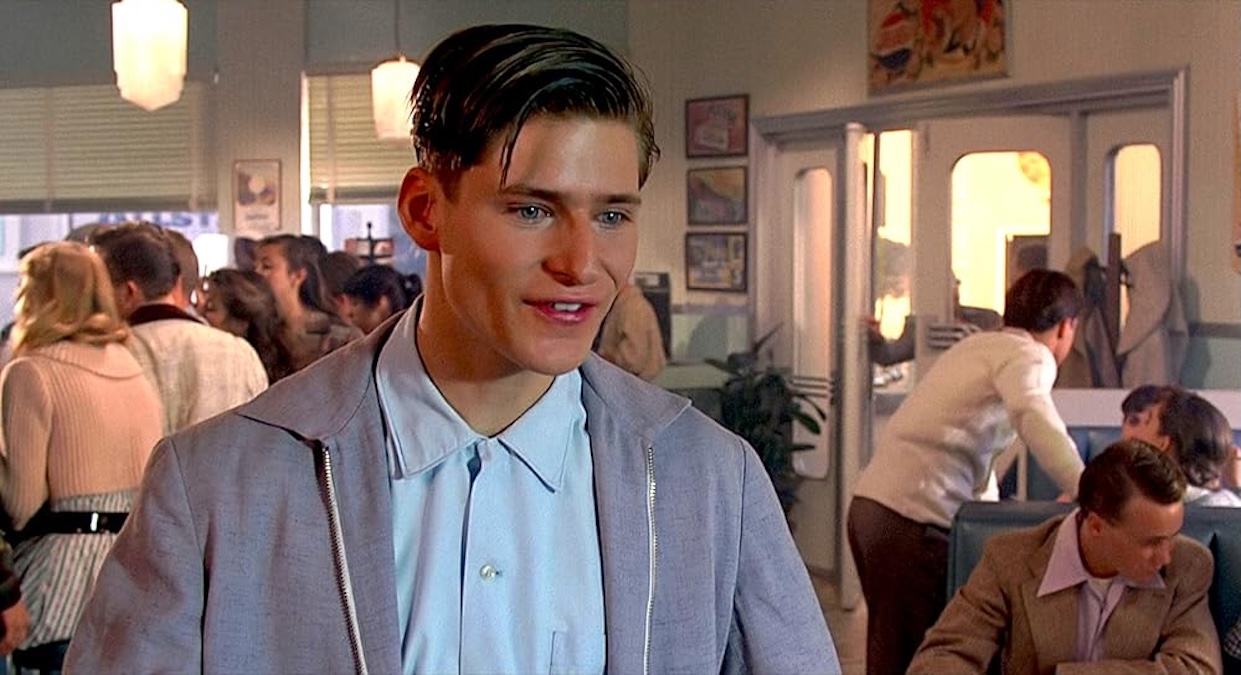 a man standing in a restaurant