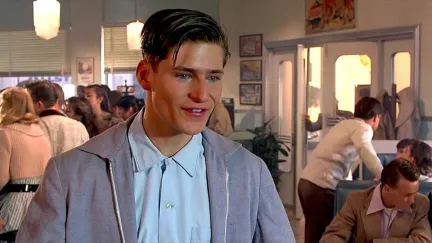 a man standing in a restaurant