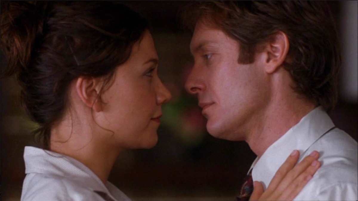 Two lovers gaze into each other's eyes in "Secretary"