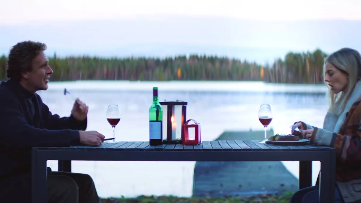 two people sittin at a table