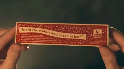 a box with two hands