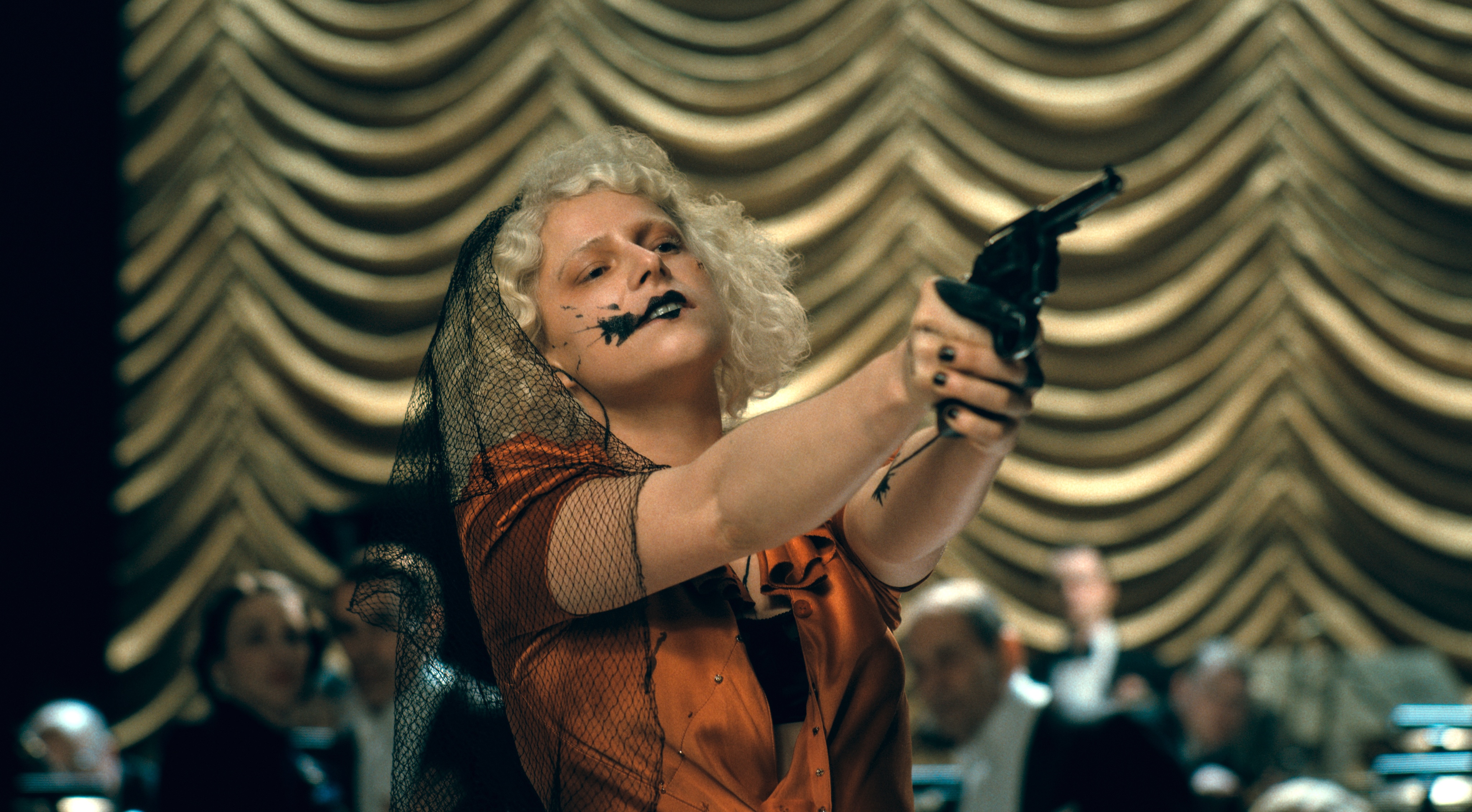 a woman holding a gun