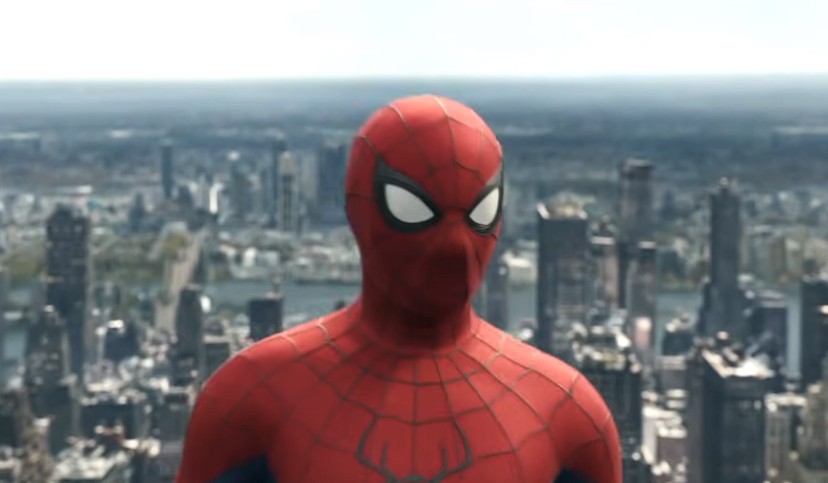 spider-man standing above the city