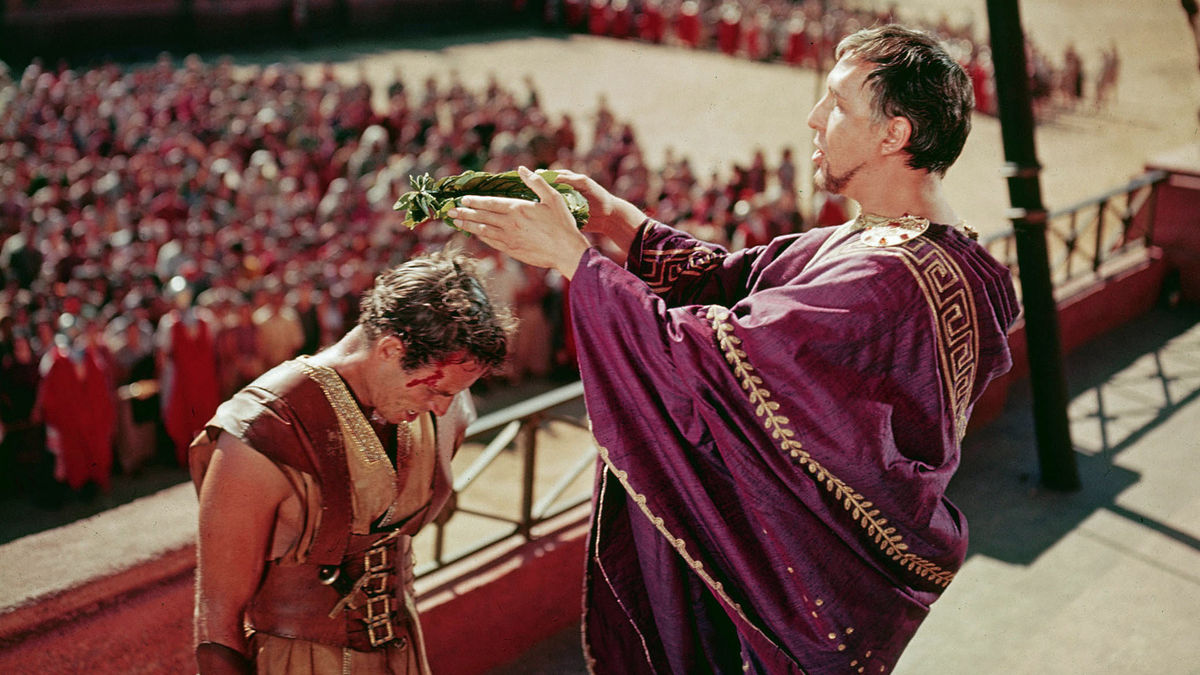 A roman royal crowns a man in "Ben-Hur"
