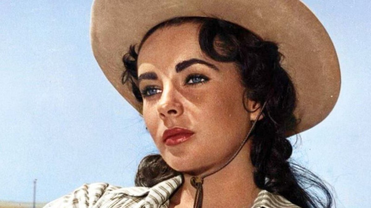 A woman in a cowboy hat looks into the distance in "Giant"