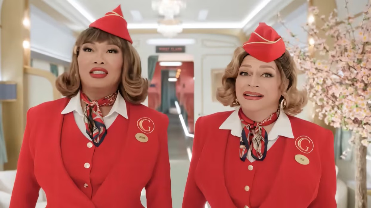 Two stewardesses walk down a hallway in Stop! That! Train!