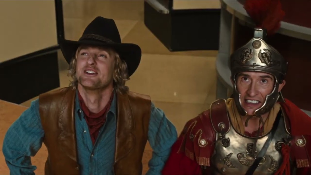 A cowboy and a centurion look up happily in Night at the Museum