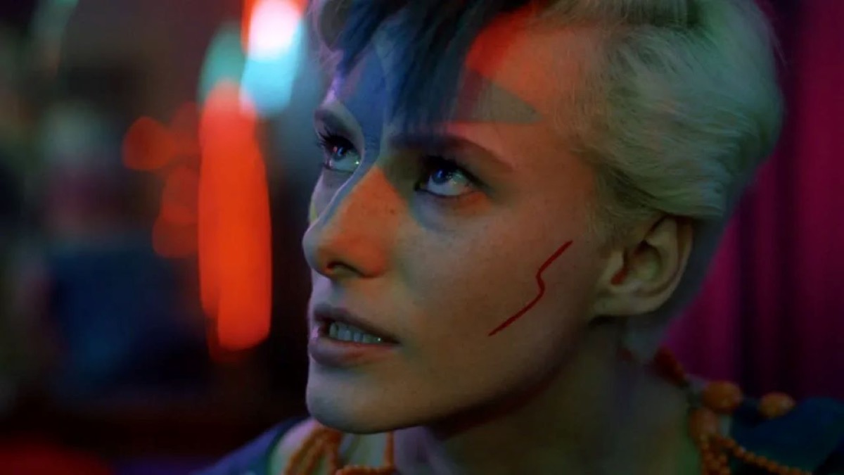 A genderqueer club-goer looks up angrily in Liquid Sky