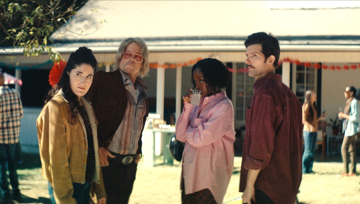 four people at a party