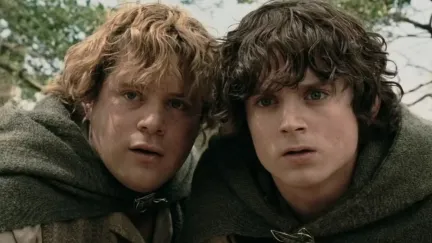 Frodo and Sam look curiously at something in the distance in The Lord of the Rings