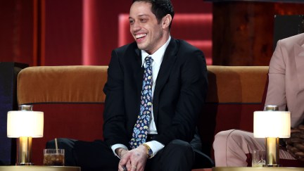 man sitting on couch