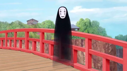 No Face haunts a bridge in the daylight in Spirited Away