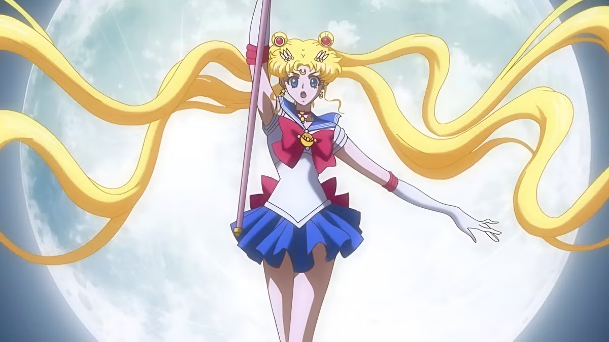 Sailor Moon floats triumphantly in front of the full moon