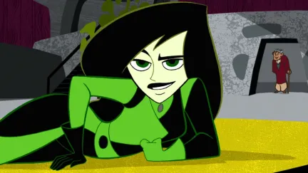 Shego leans on a table in Kim Possible
