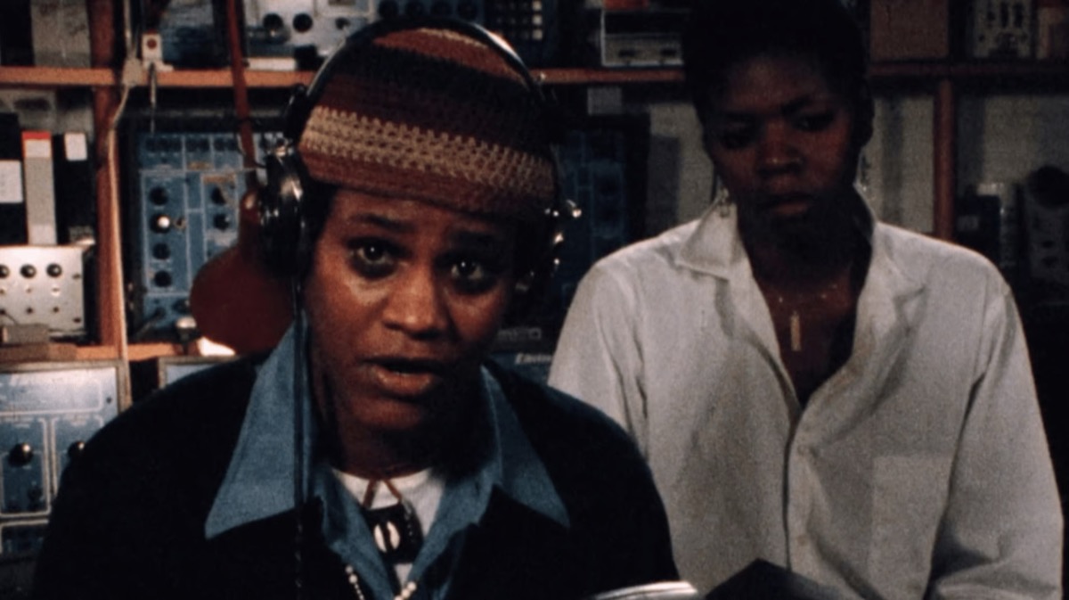 Two women broadcast in a pirate radio station in Born in Flames