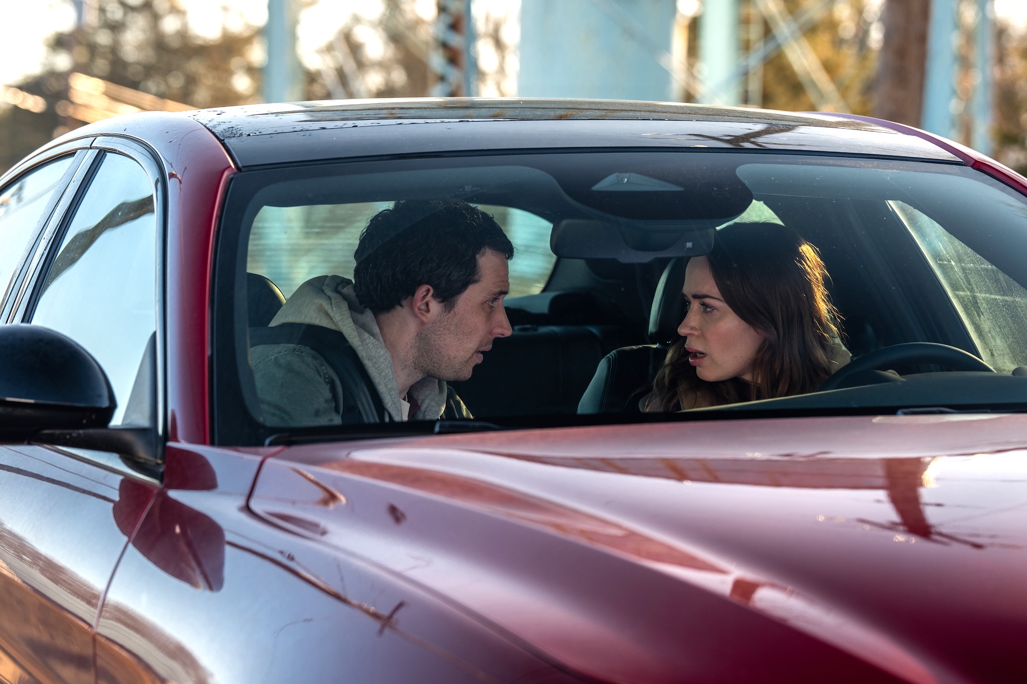 two people sitting in a car