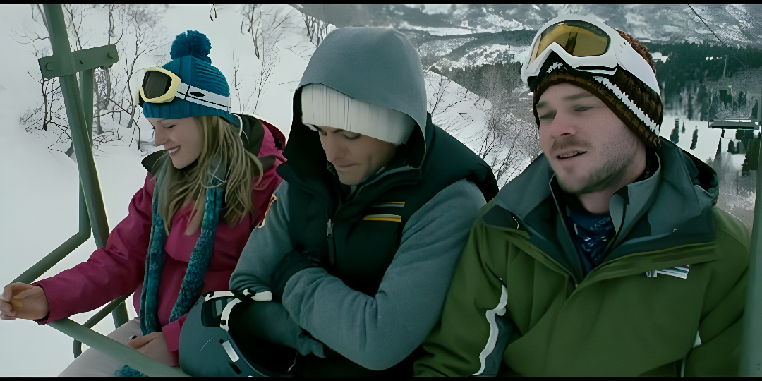 Three people sitting on a ski lift from the movie Frozen