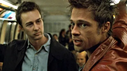 Two men on a subway train.