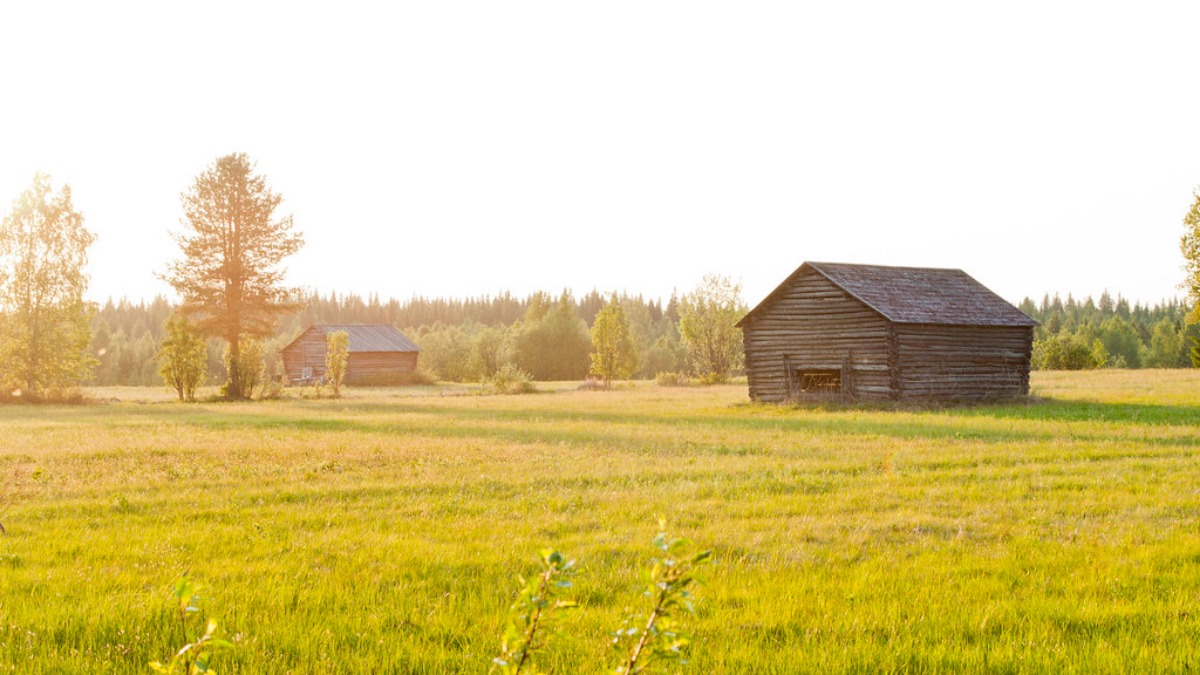A small traditional Finnish warehouse in the countryside