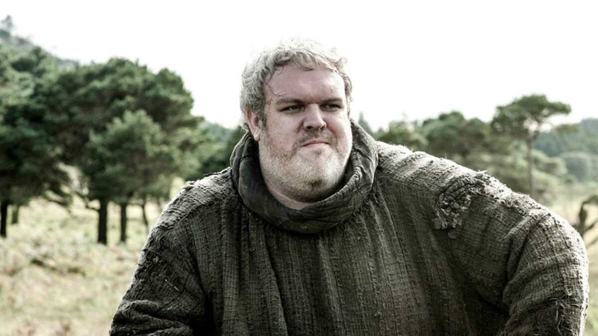 Hodor sits on a rock in Game of Thrones