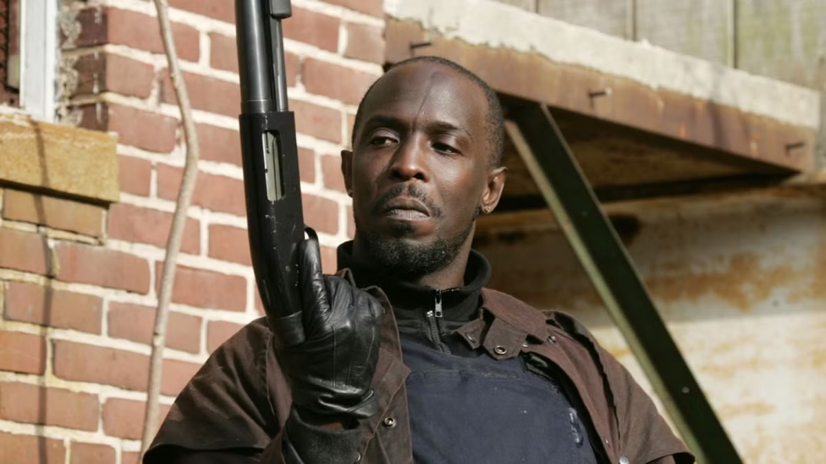 Omar Little holds a shotgun in The Wire