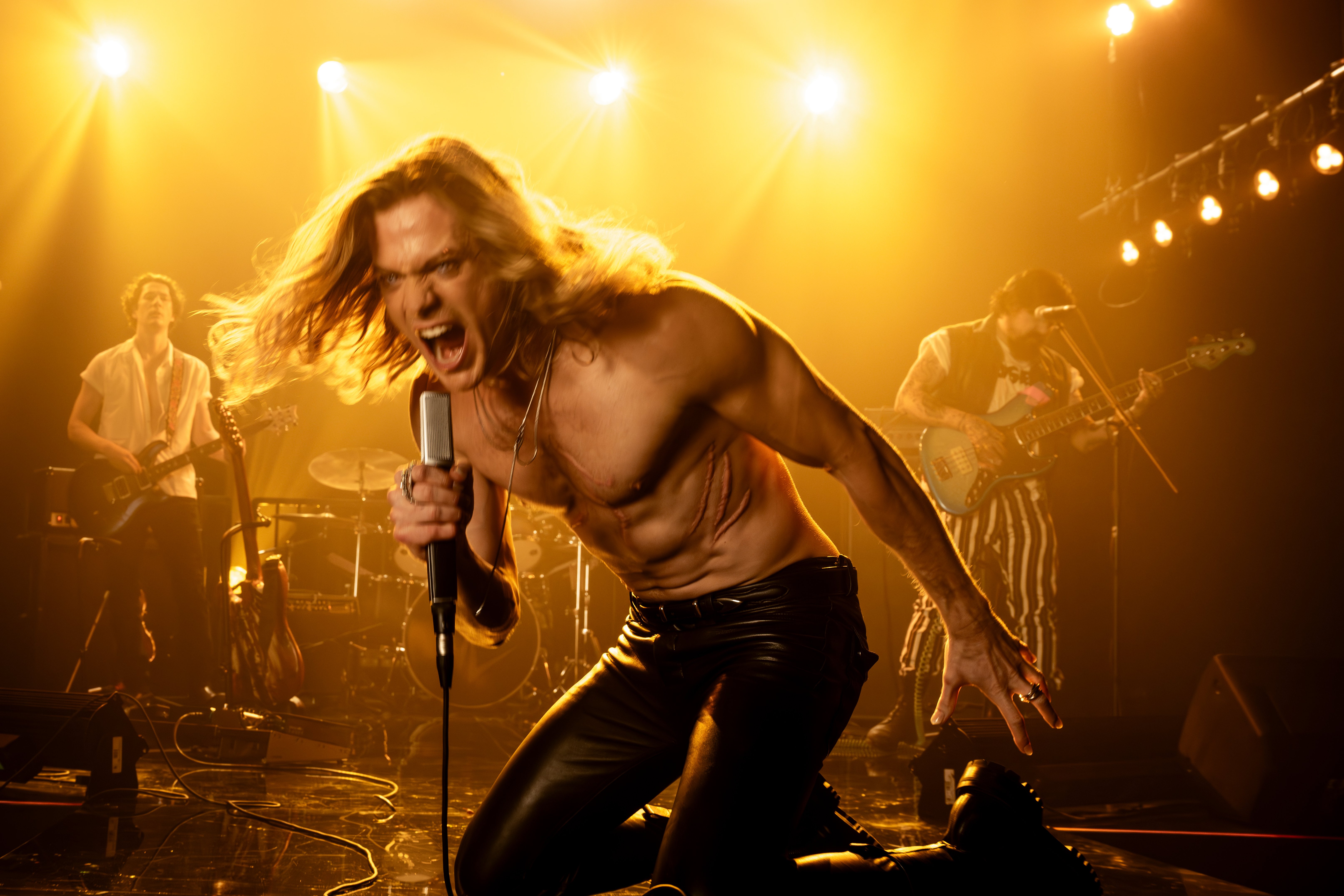 man screaming into mic