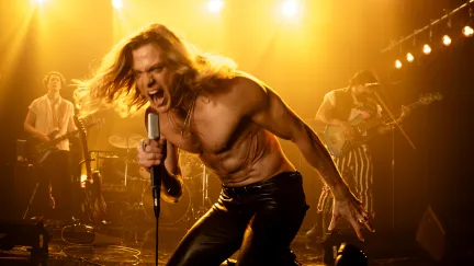man screaming into mic
