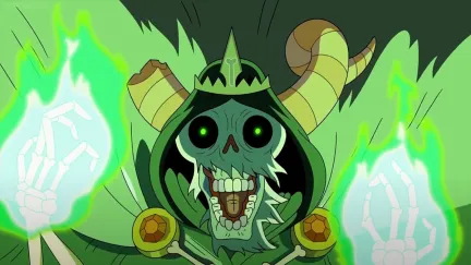 The Lich laughs surrounded by green flame in Adventure Time