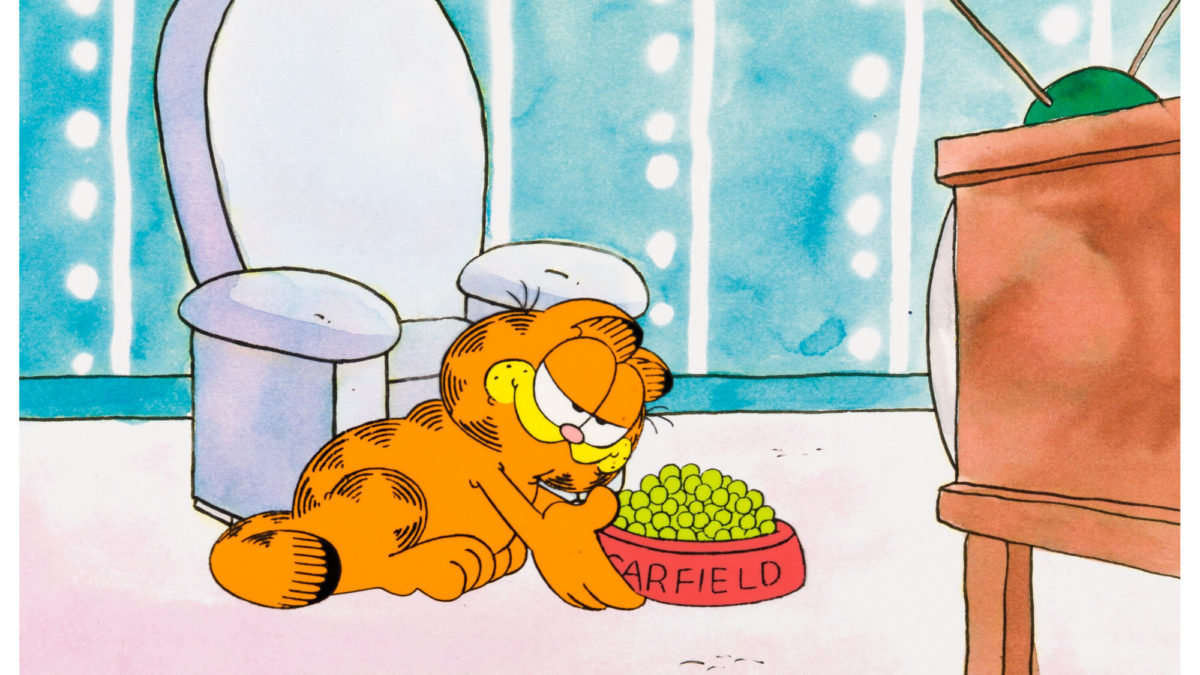Garfield the Cat sits with a bowl of food in a "Garfield" comic