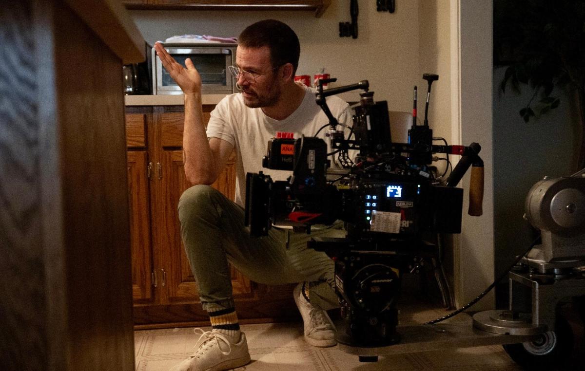 A photo of Zach Cregger directing on the set of "Weapons"