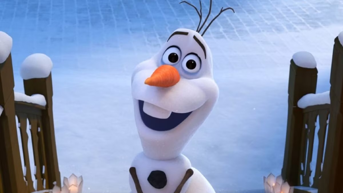 Olaf from Frozen smiles on a front porch in the snow
