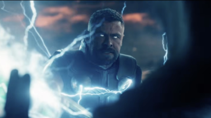 Lightning surrounds an angry god with an axe