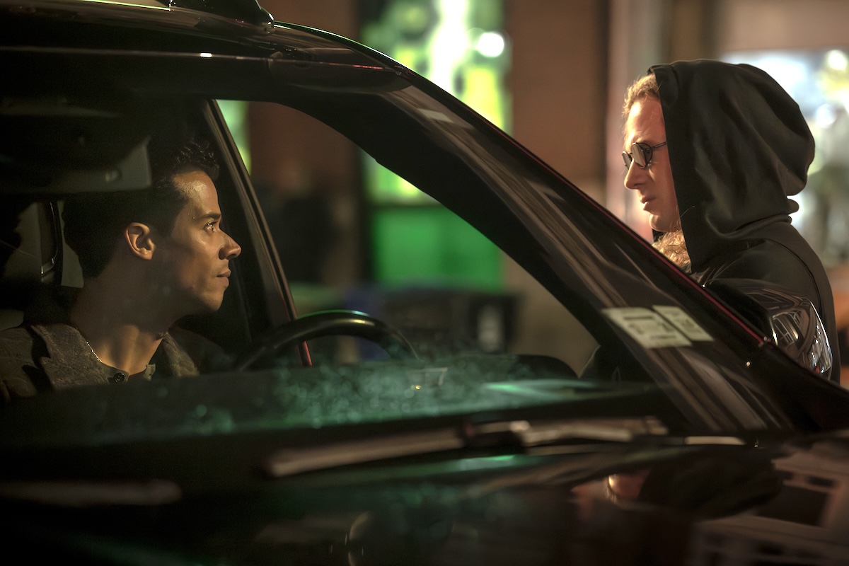 two men and a car