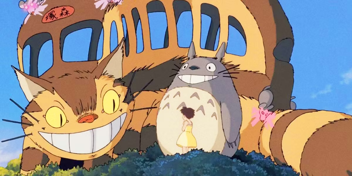 The Cat bus smiles at a little girl in My Neighbor Totoro