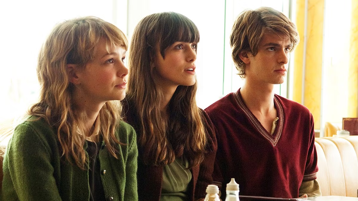 Tommy and Kathy and Ruth sit together in "Never Let Me Go"