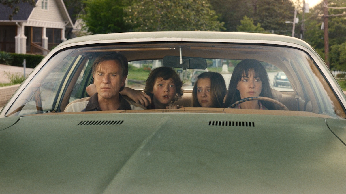 four people in a car