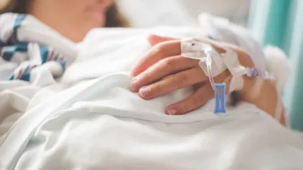 Woman with IV, Image by Stephen Andrews on Pexels.