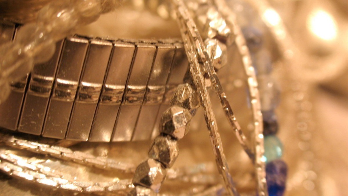 A pile of gold bracelets