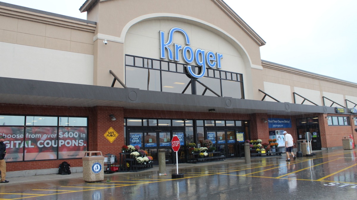Man confronts driver after a Kroger parking-lot crash. Moments later, she drags ...