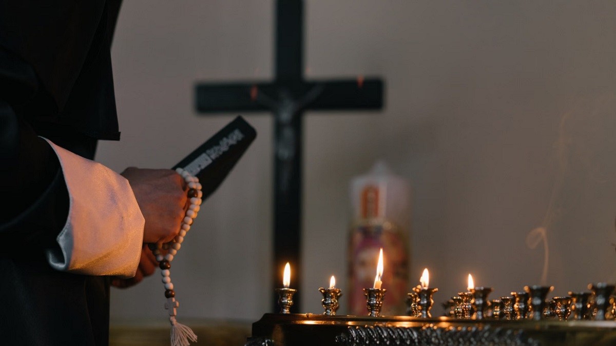 Priest With Religious Objects
